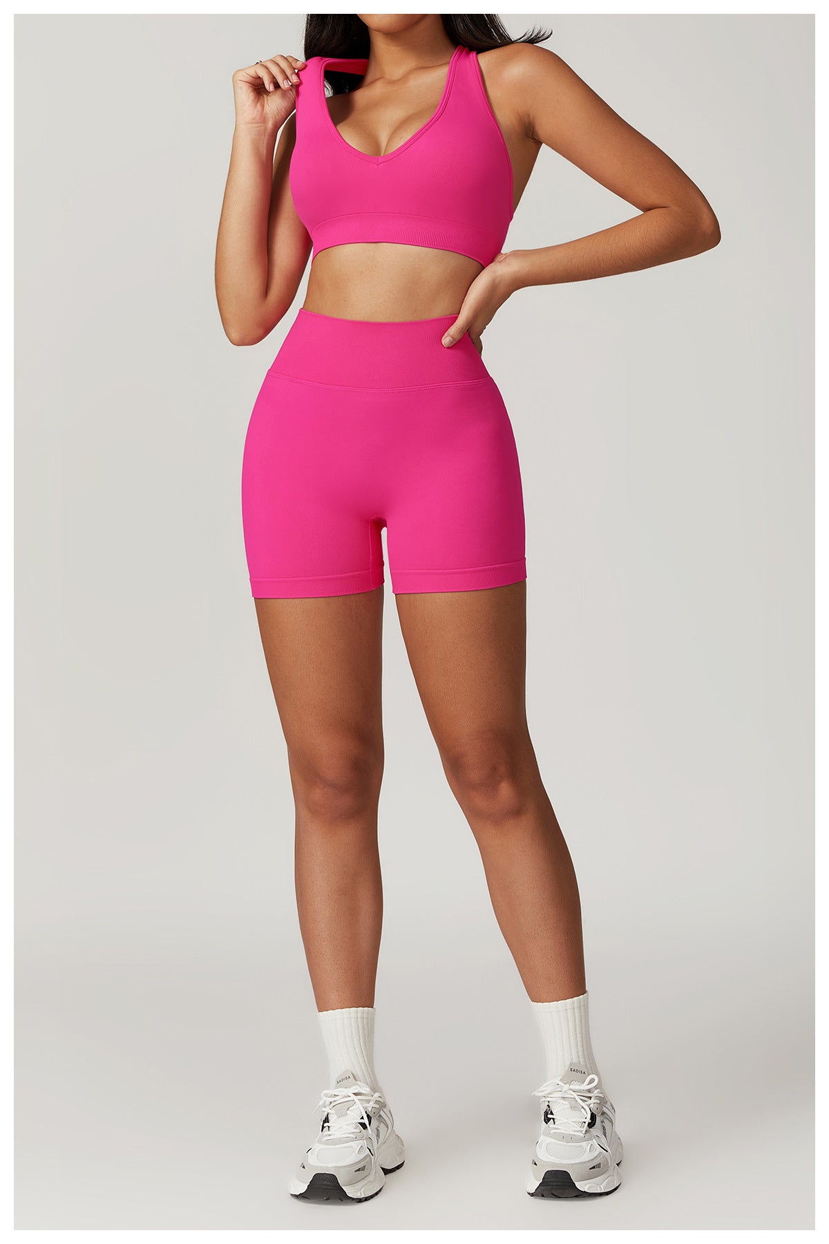Pink Seamless Yoga Suit featuring athletic shorts and top for optimal performance