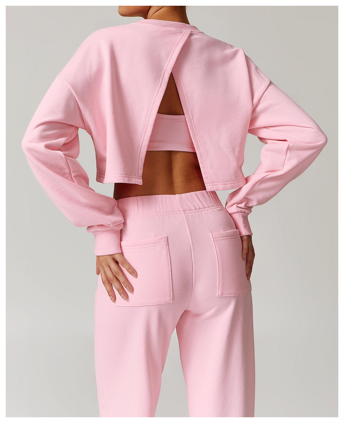 Pink long sleeve athletic wear set, ideal for fashion-forward sports and workouts