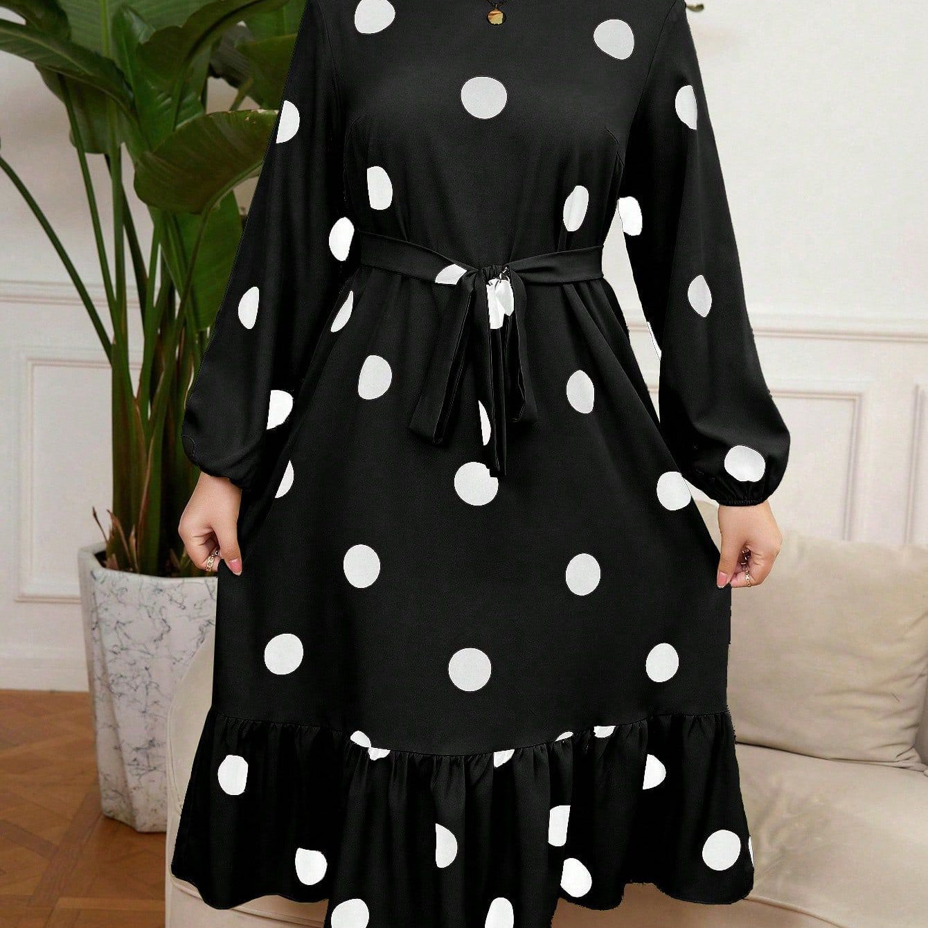 Black polka dot Lotus Leaf Dress with hem lotus leaf detail and long balloon sleeves