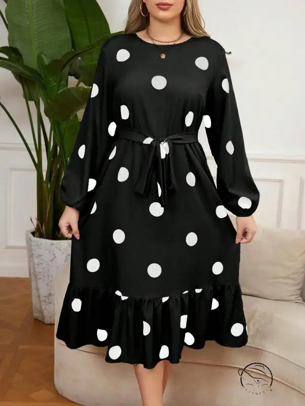 Black polka dot lotus leaf dress with balloon sleeves and tie-waist