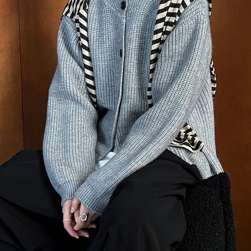 Gray knit cardigan with regular sleeves and striped scarf, perfect for fashion style