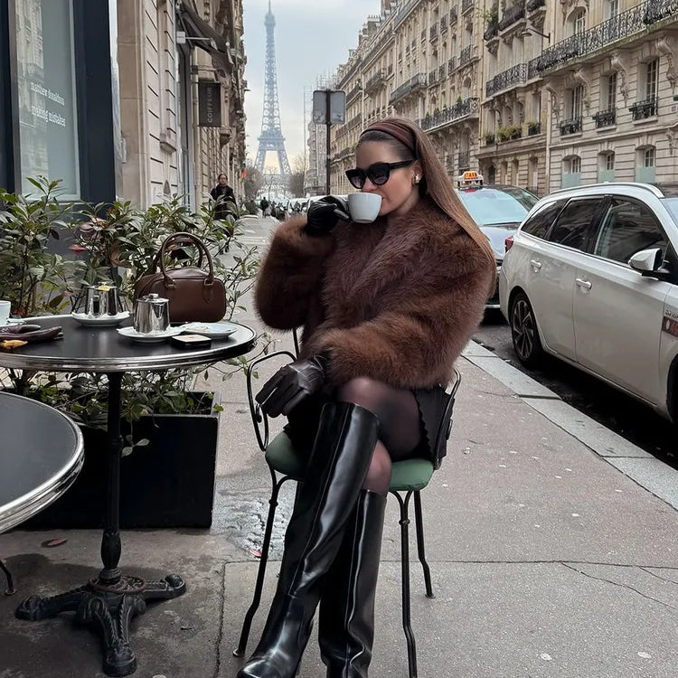 Gorgeous faux fur Langry fox jacket with black leather pants and boots