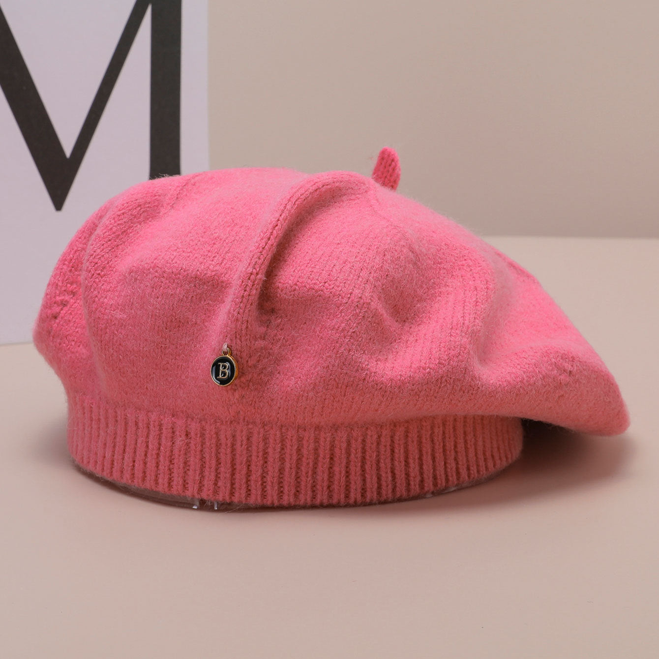 Pink knitted beret with charm for stylish langry fashion and ملابس shopping