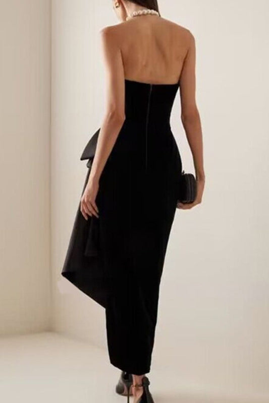 Elegant design sleeveless split dress in black with asymmetrical hem and gold heels