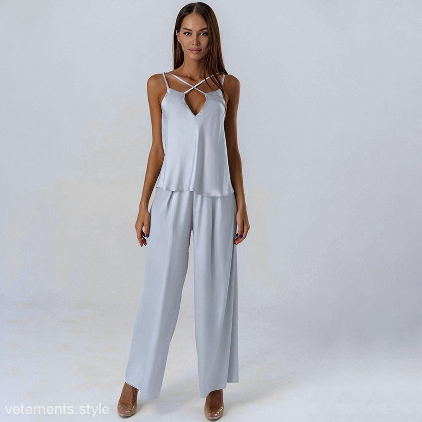 Woman in light blue satin two-piece silk sexy cool pajamas, stylish and comfortable