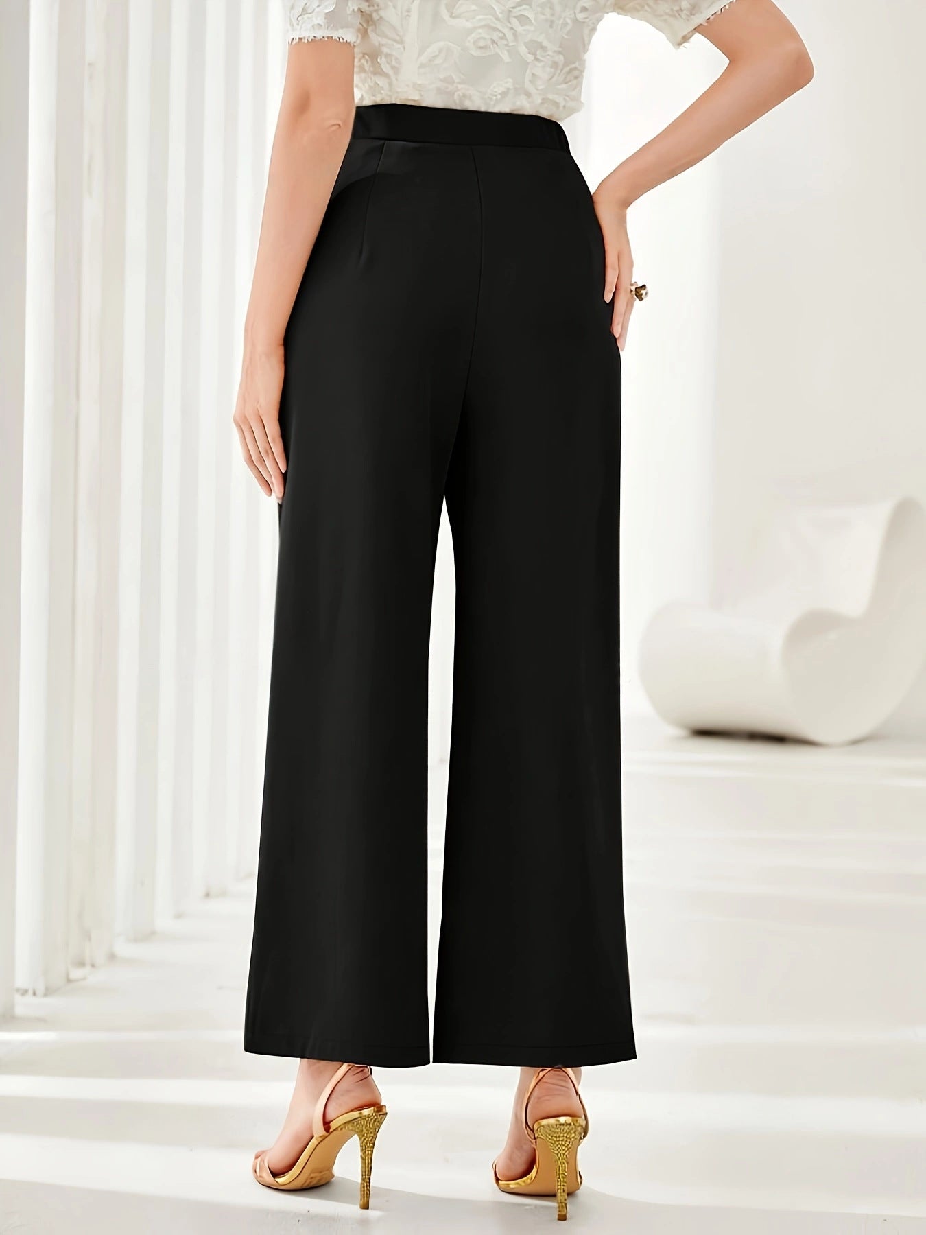 Black wide leg cropped dress pants featuring a high waist for stylish fashion versatility