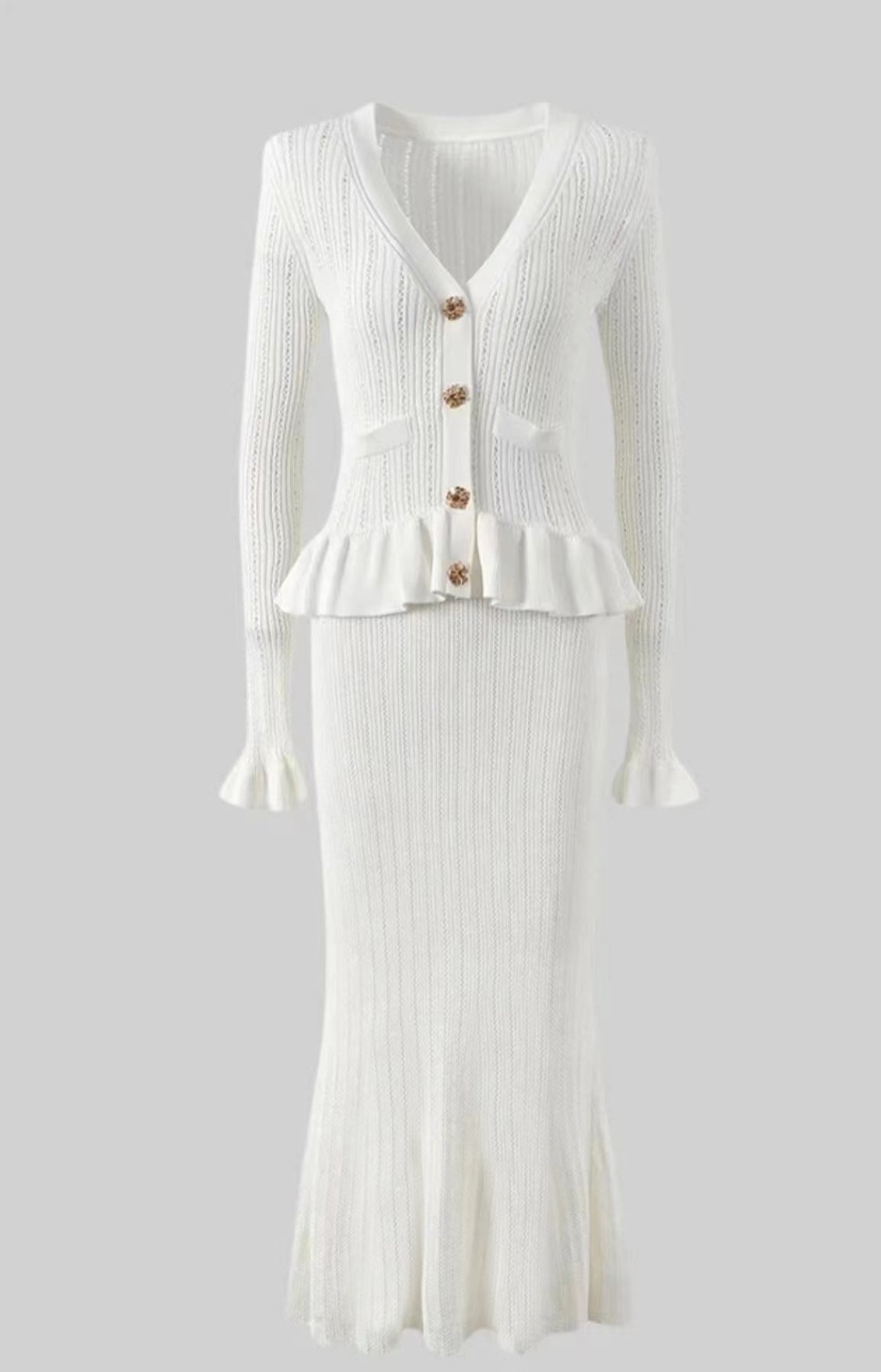 Elegant white ribbed knit dress and skirt set showcasing timeless fashion style