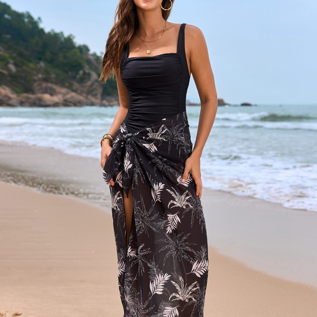 Black and white tropical print sarong with black swimsuit top, elegant Langry fashion ملابس