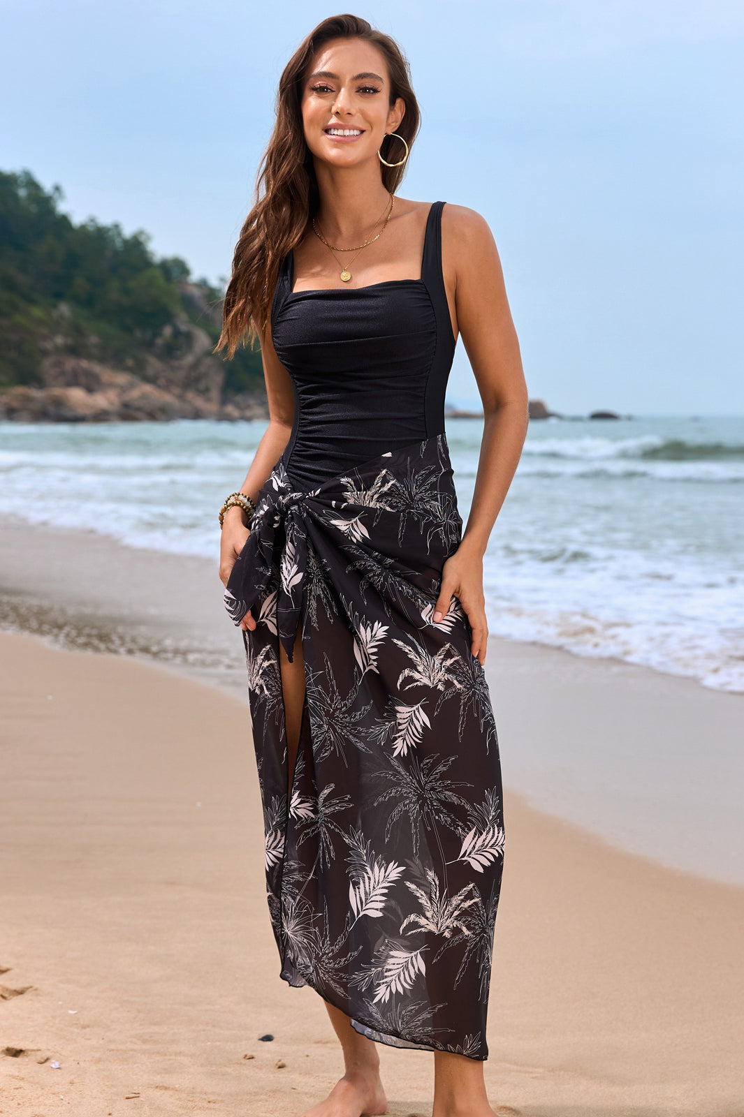 Black and white tropical print sarong with black swimsuit top, elegant Langry fashion ملابس