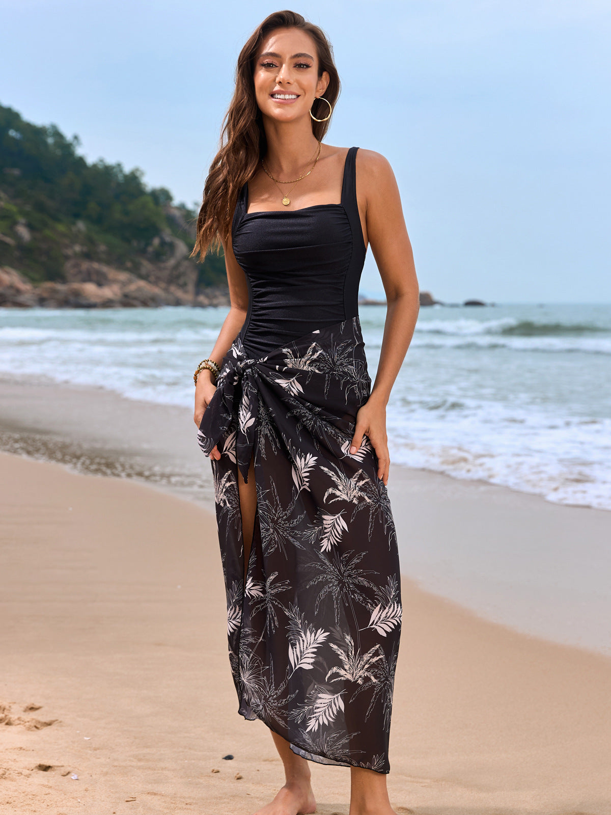 Black and white tropical print sarong with black swimsuit top, elegant Langry fashion ملابس