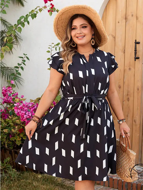 Black and white patterned comfortable tight waist dress with straw hat
