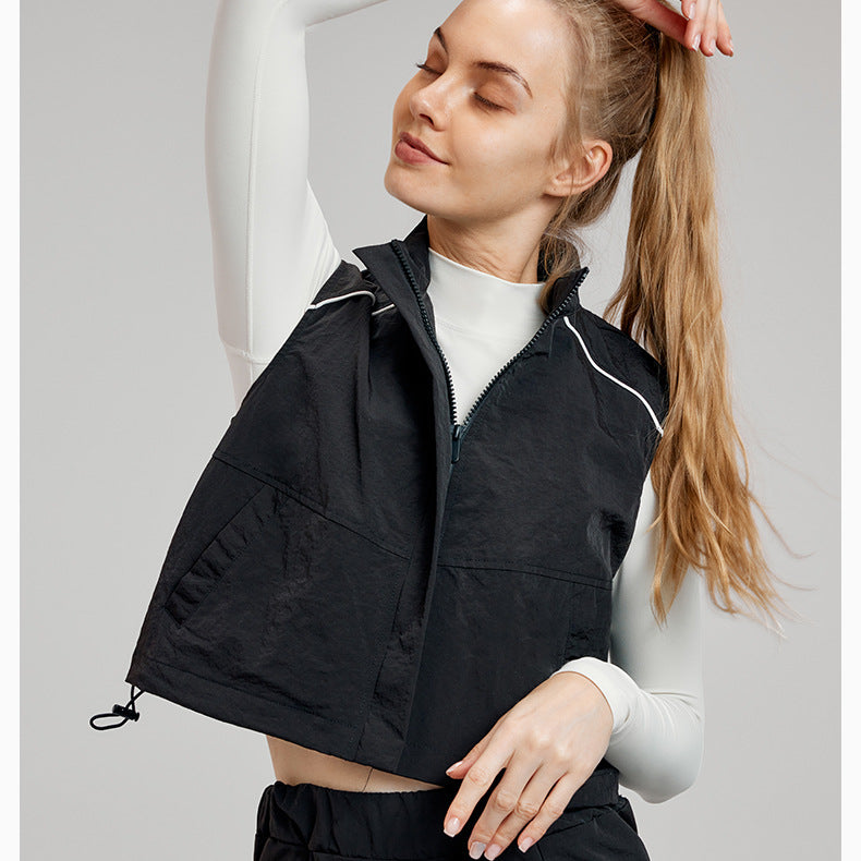 Black cropped vest with white trim, ideal for casual fashion and langry ملابس