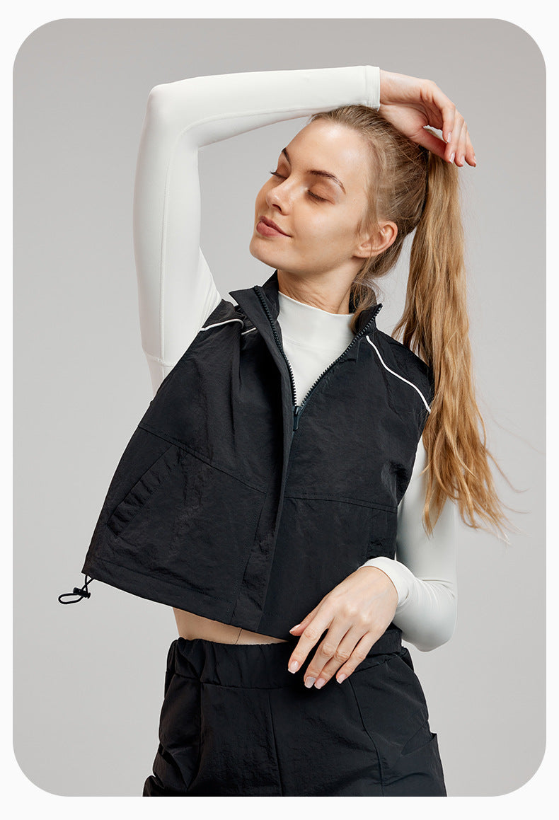 Black cropped vest with white trim, ideal for casual fashion and langry ملابس