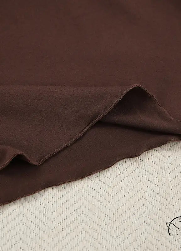Folded brown textured fabric for comfortable knitted pajamas