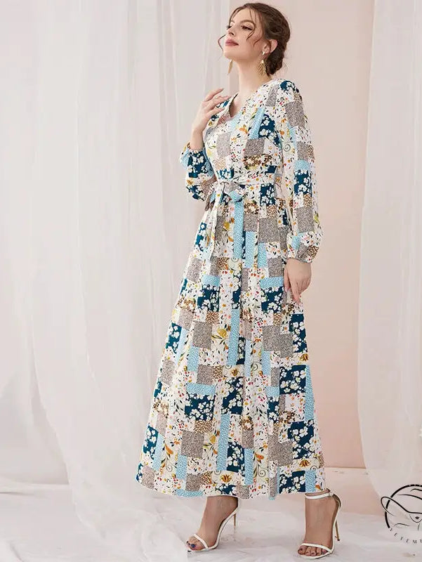 Woman in floral print slim fit fresh maxi dress with patchwork patterns
