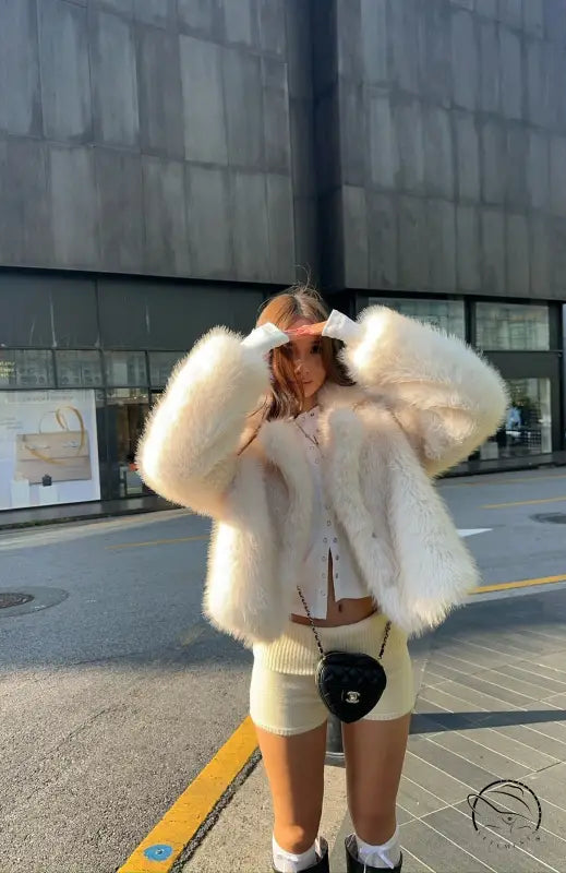 Langry cream fluffy faux fur coat with cropped fit and oversized sleeves