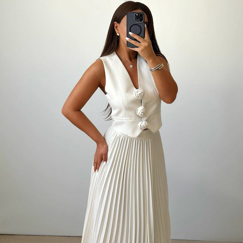 Elegant woman in white vest and pleated skirt showcasing high-grade summer fashion attire