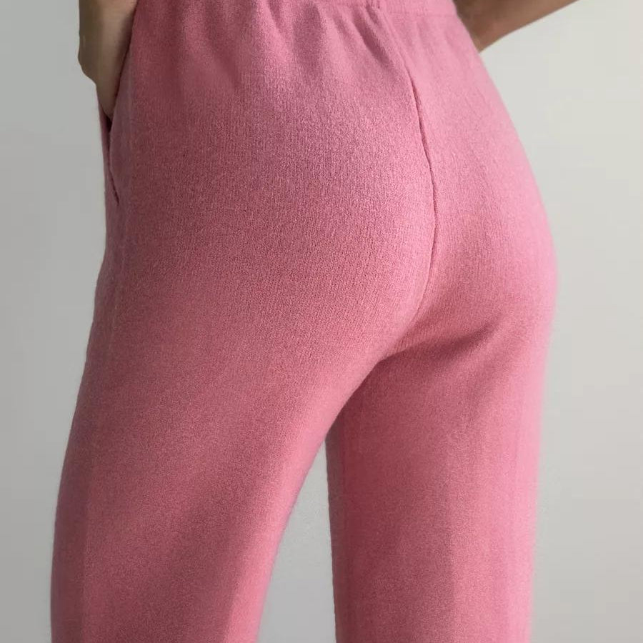 Pink knit pants featured in the stylish High Collar Zipper Knitted Sweater Suit, langry fashion