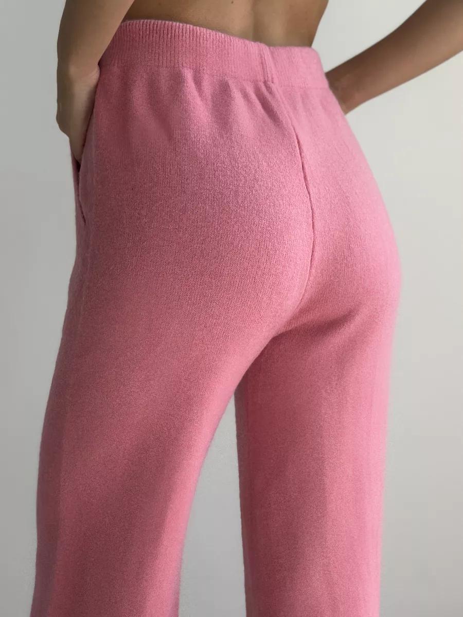 Pink knit pants featured in the stylish High Collar Zipper Knitted Sweater Suit, langry fashion