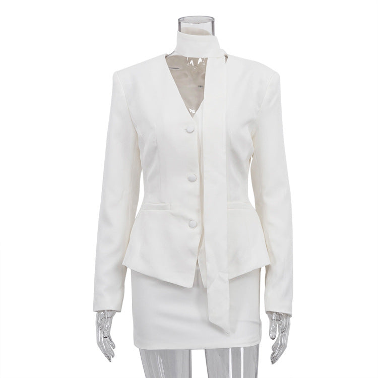 Elegant langry white peplum blazer with bow detail in fashion set