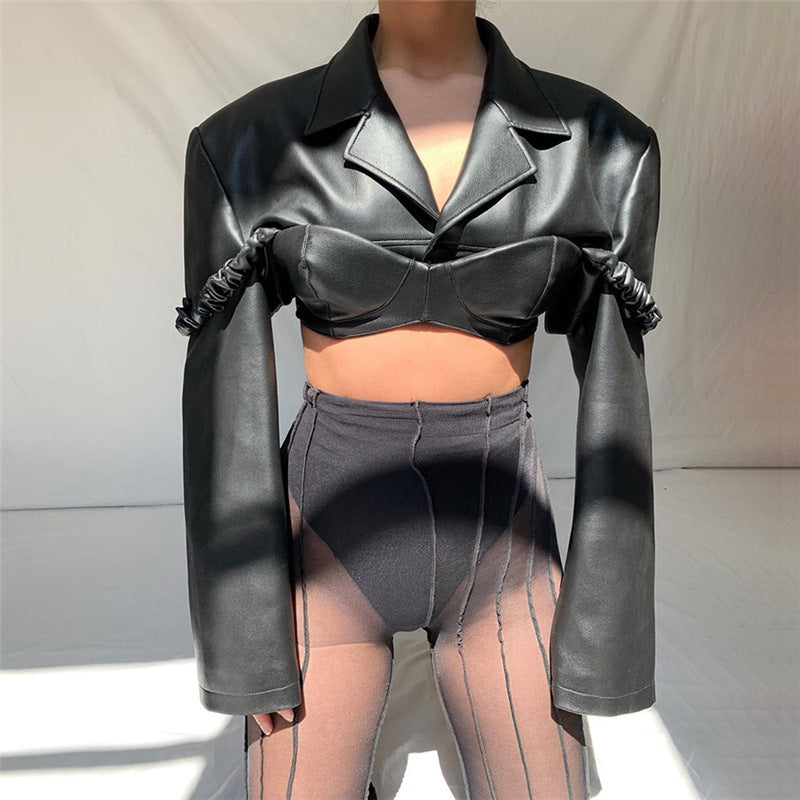 Elegant slimming faux leather shacket paired with black tights for a fashionable look