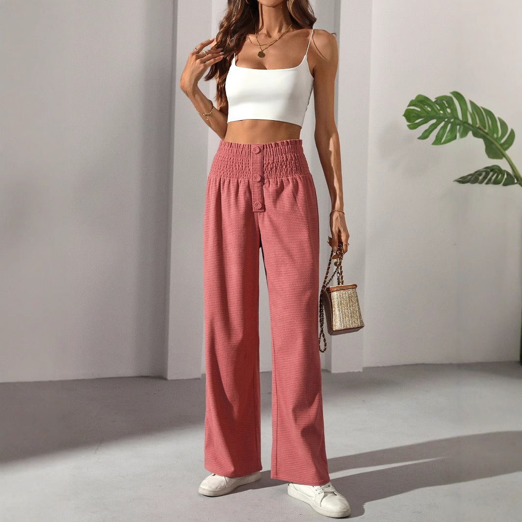 Women wearing casual elegant French trousers with high-waisted wide-leg design