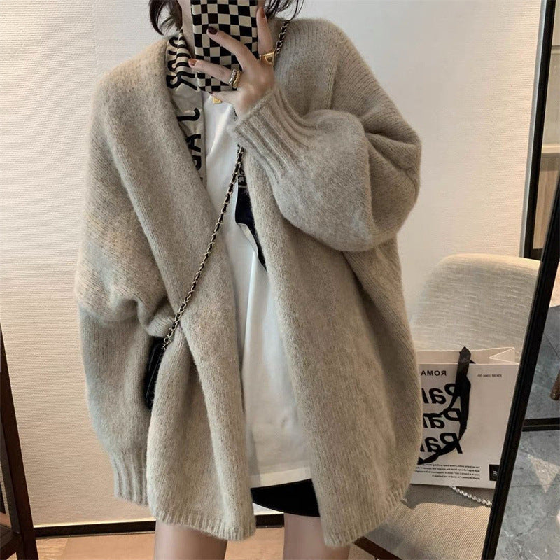 Oversized beige long sleeve cardigan from Gentle Mid Length Knitted Coat fashion collection