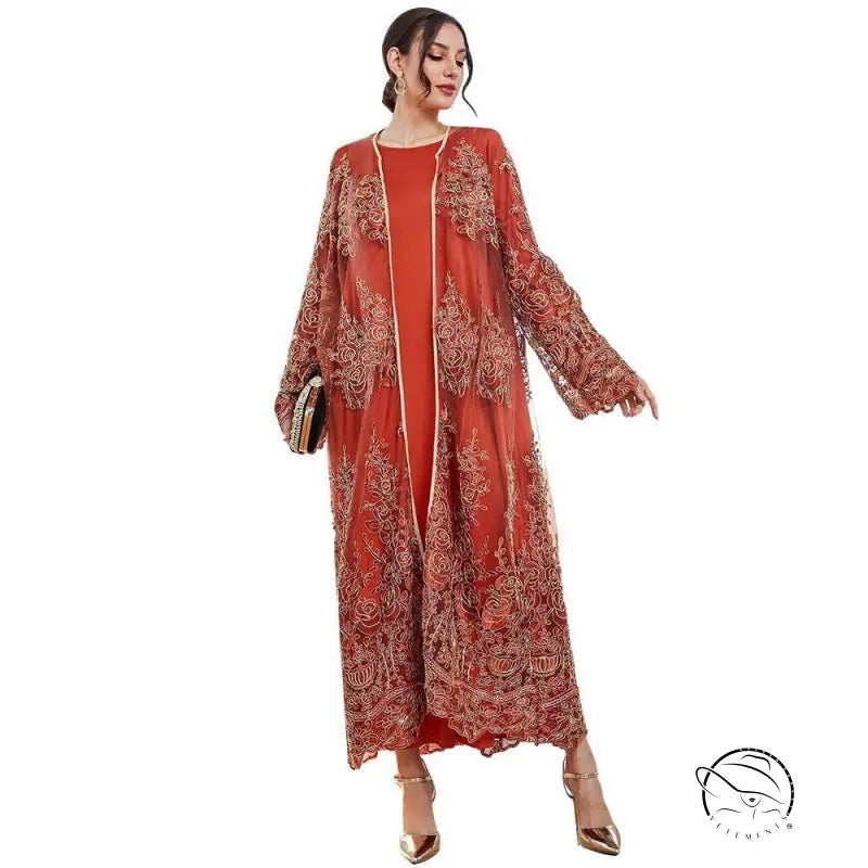 Elegant rust-colored langry fashion abaya with gold embroidery and sheer mesh overlay