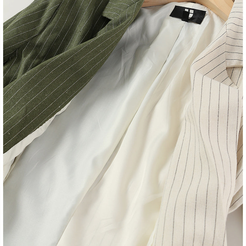 Elegant Colorful Blazer on hanger, showcasing stylish stripes for modern fashion lovers