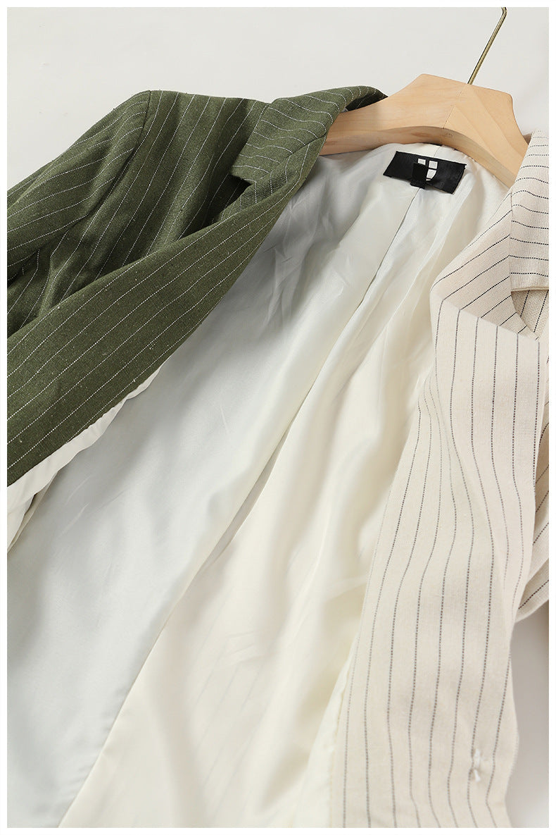 Elegant Colorful Blazer on hanger, showcasing stylish stripes for modern fashion lovers