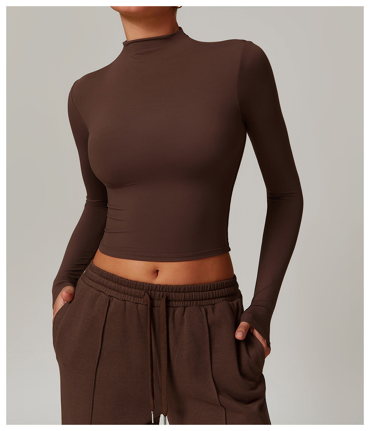 Brown long-sleeved crop top with mock neckline for stylish fitness sports outerwear