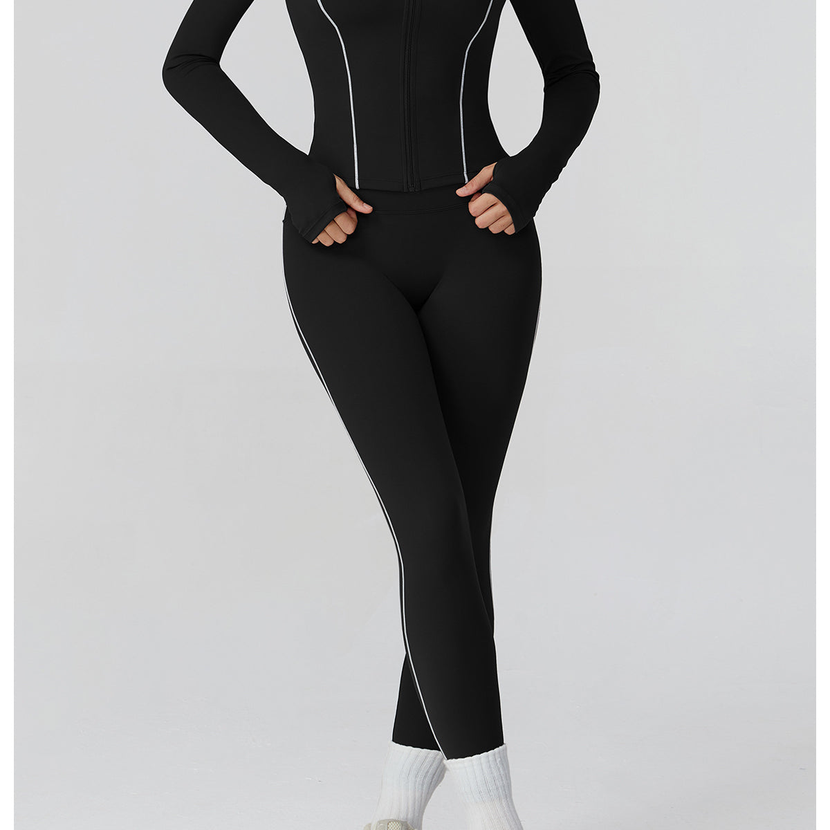 Langry black and white athletic jumpsuit with silver accents for fashion fitness