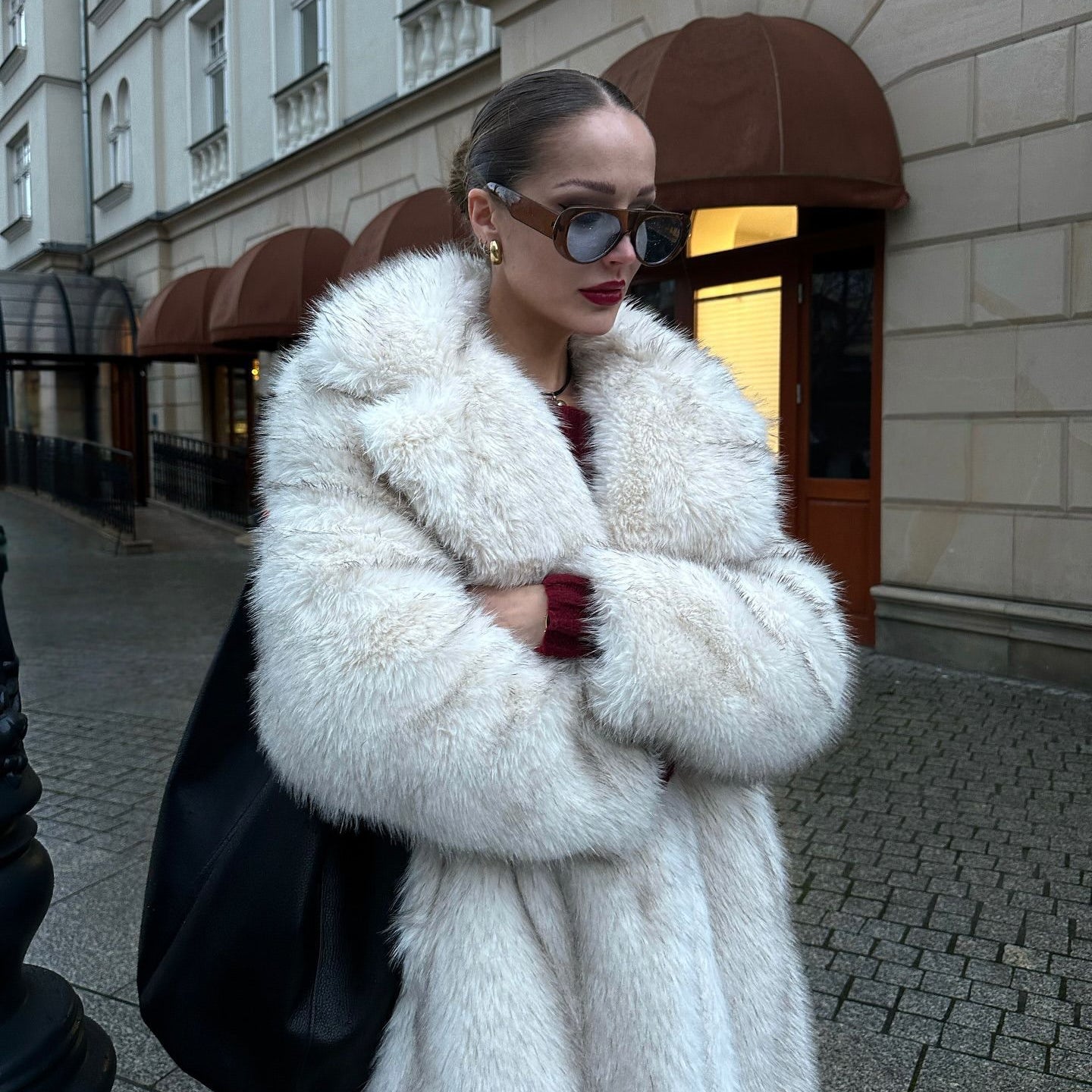 Warm winter faux fur coat with white hood and oversized collar