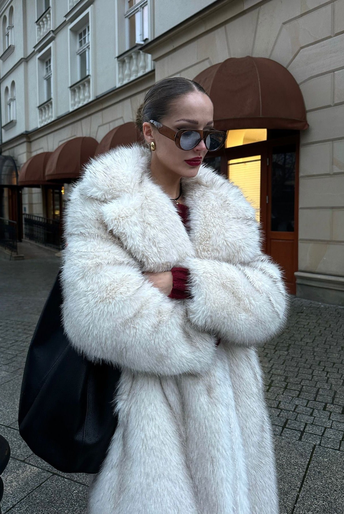 Warm winter faux fur coat with white hood and oversized collar