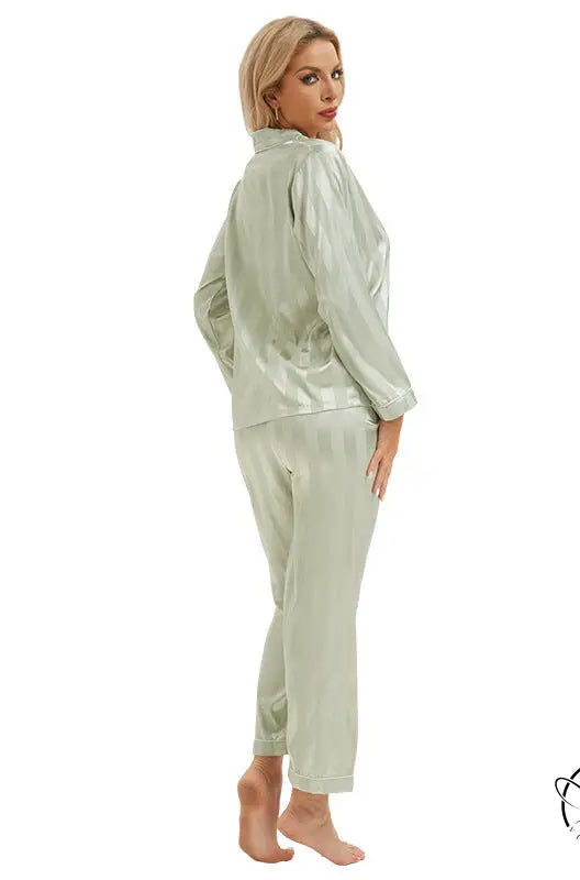 Woman in light green satin langry pajamas, long sleeves and tapered pants, fashion ملابس