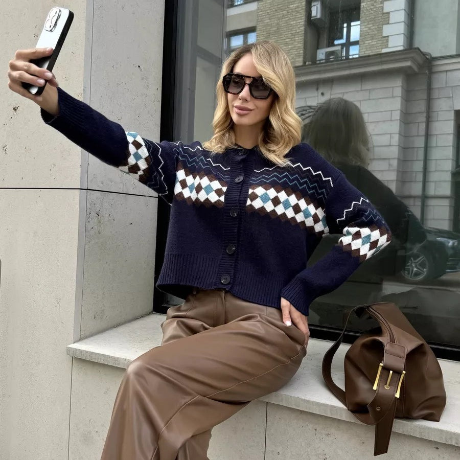Woman in patterned Jacquard Knitted Cardigan Sweater with regular sleeve taking a selfie, showcasing fashion excellence
