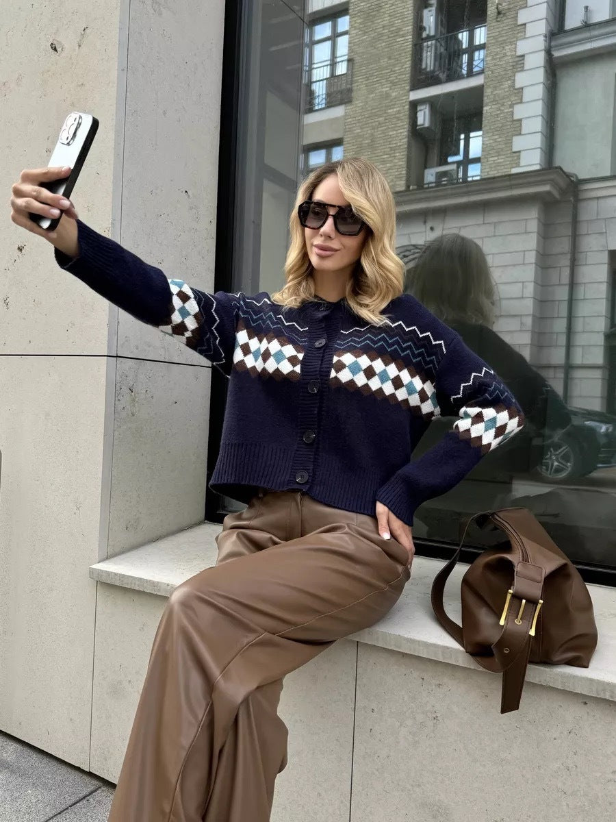 Woman in patterned Jacquard Knitted Cardigan Sweater with regular sleeve taking a selfie, showcasing fashion excellence