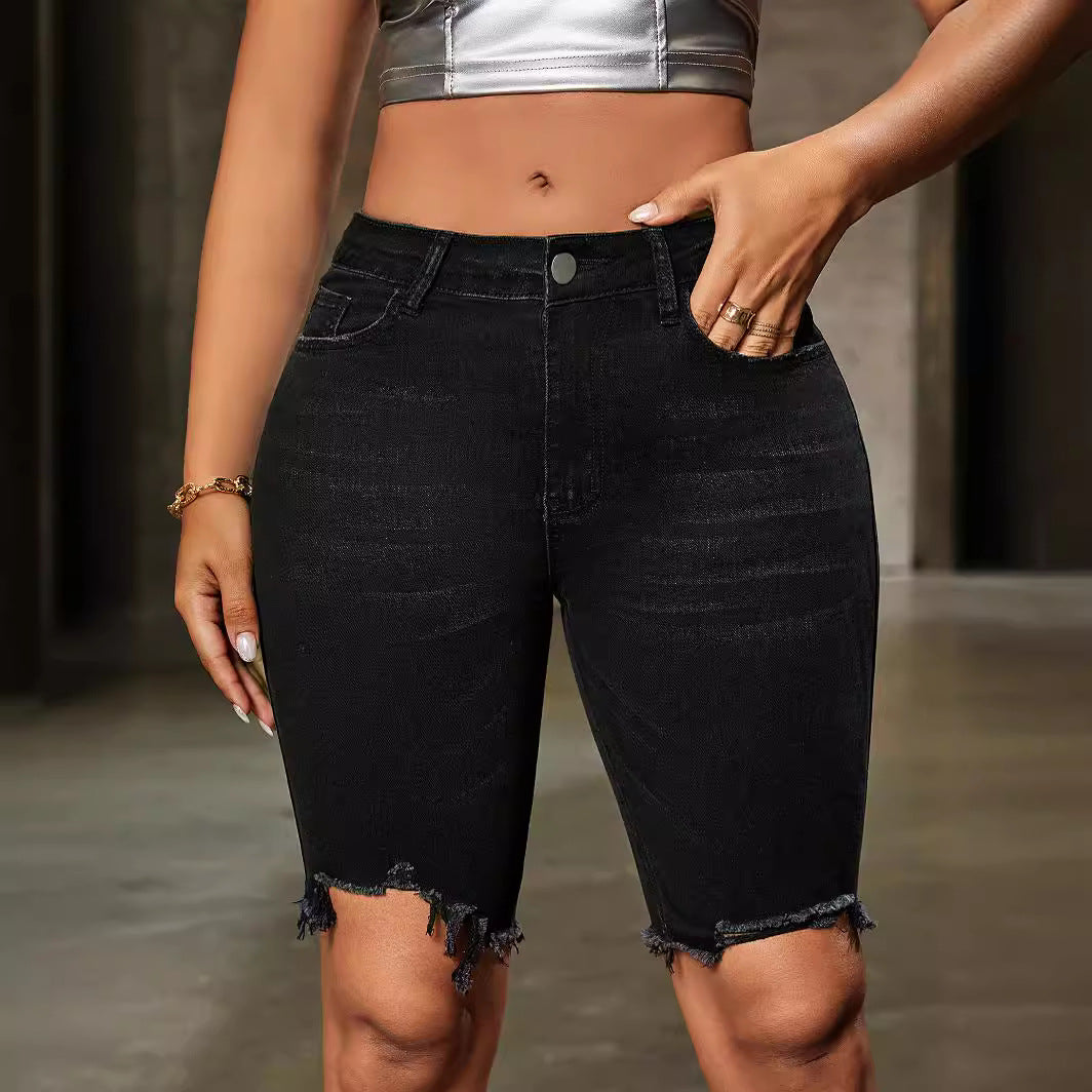 Black distressed denim shorts with frayed hem, stylish high waist fashion casual pants
