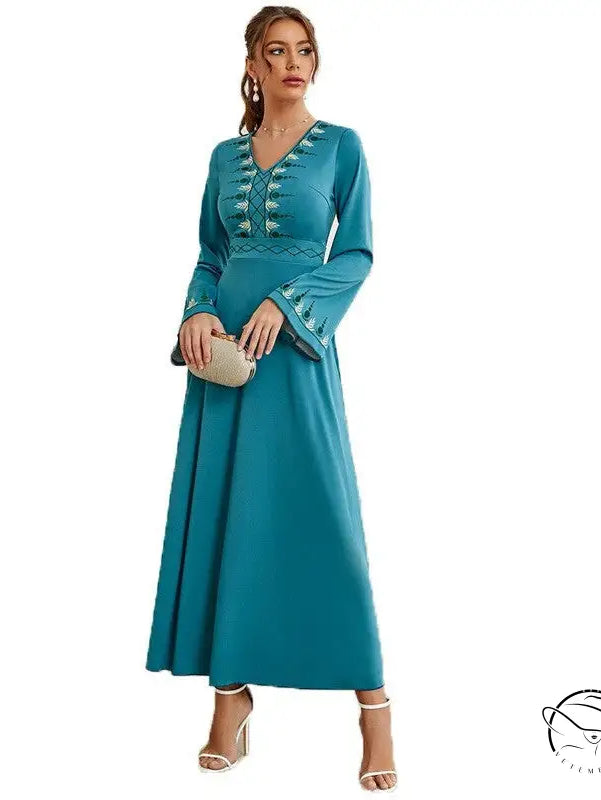 Elegant teal V-neck langry fashion dress with white embroidery