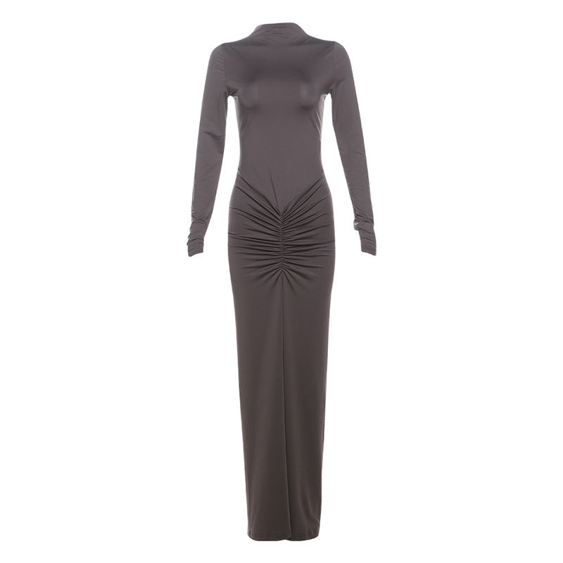 Elegant gray long-sleeved maxi dress with ruched design for luxurious fashion