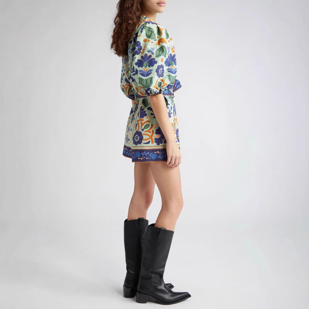 Floral print two-piece set styled with black knee-high boots for stunning fashion looks