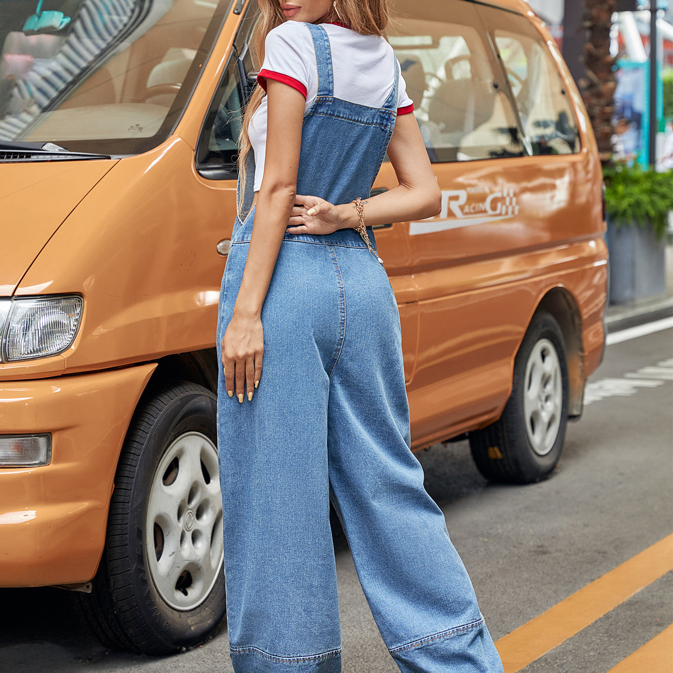 Casual denim jumpsuit featuring stylish wide-leg overalls for fashionable women