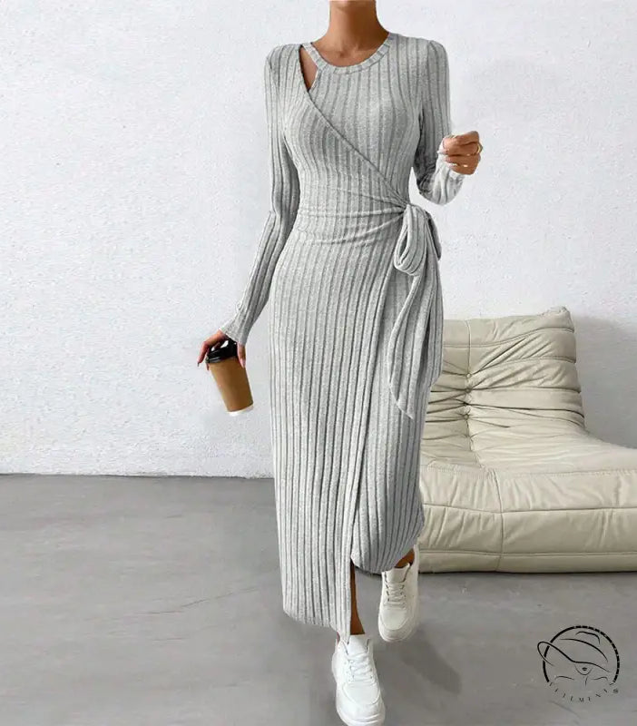 Warm knitted gray maxi dress with long sleeves and side slit