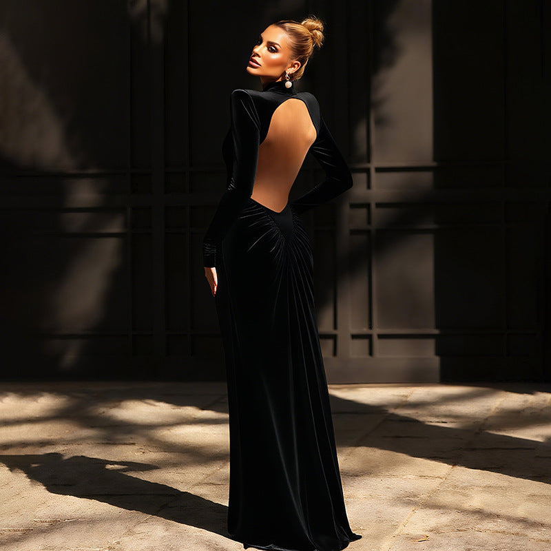 Black velvet high collar maxi dress with open back and long sleeves