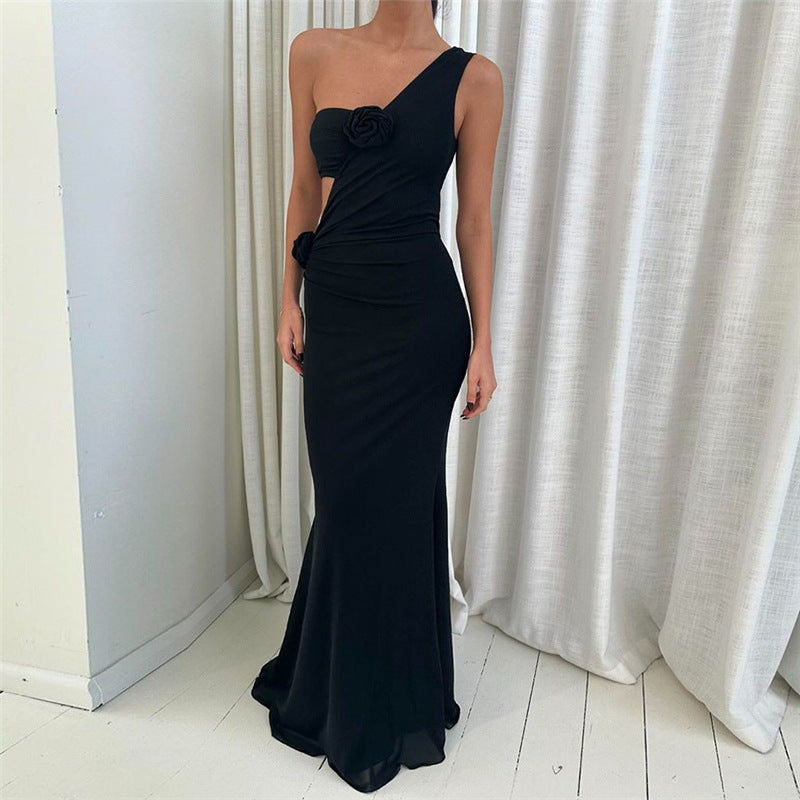 Elegant black one-shoulder gown with floral accents, perfect for langry fashion lovers