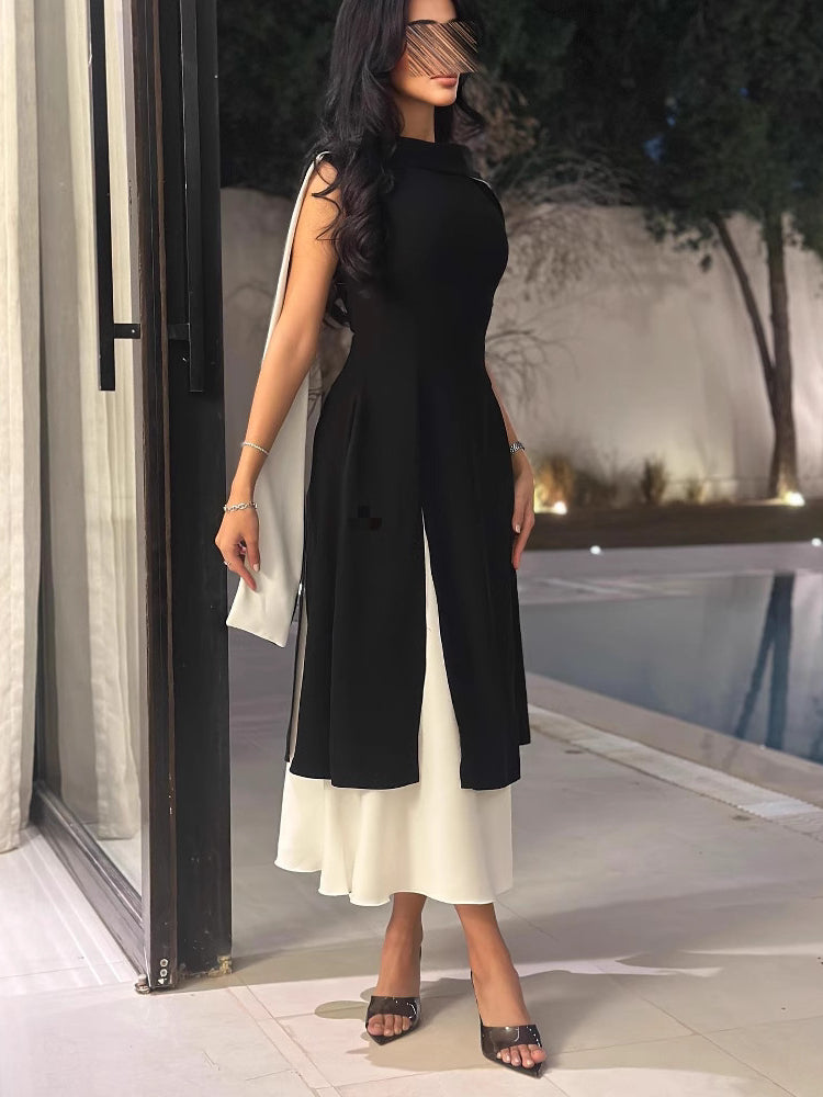 Langry fashion black and white sleeveless jumpsuit with side slit and open back