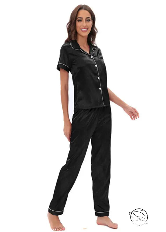 Langry black satin pajama set with white piping and button front