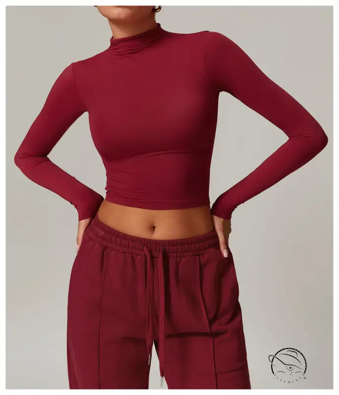 Burgundy long-sleeve mock neck crop top in quick drying fitness sports outerwear