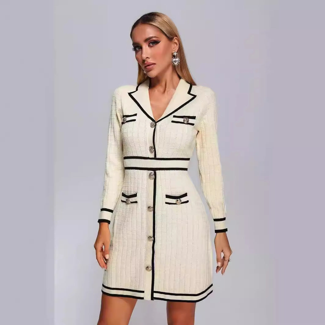 Elegant cream-colored knitted classic dress with black trim, perfect for stylish occasions