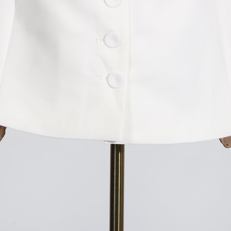 White buttoned garment in a Summer off Shoulder dress, showcasing stylish floral detail